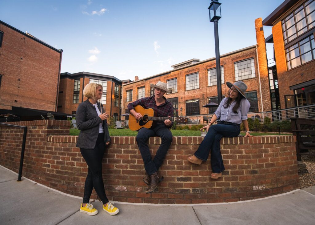 The Foundry Hotel: courtyard guitar